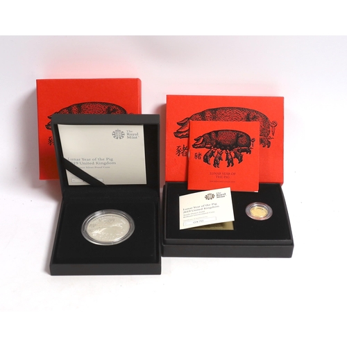 964 - Royal Mint Lunar Year of the Pig, 2019, one tenth oz gold BUNC coin and one oz silver proof coin (tw... 