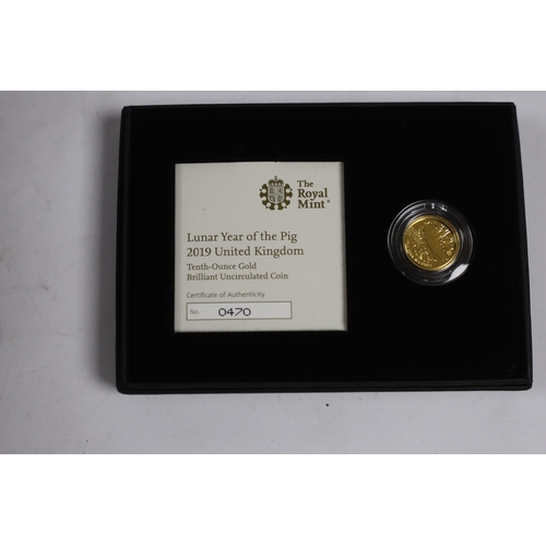 964 - Royal Mint Lunar Year of the Pig, 2019, one tenth oz gold BUNC coin and one oz silver proof coin (tw... 