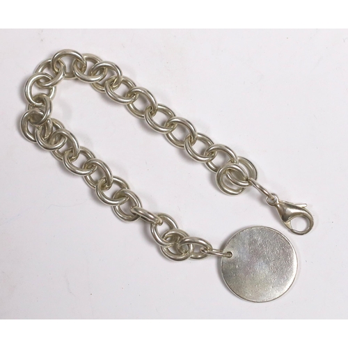 965 - A Tiffany & Co sterling circular link bracelet with tag, 20cm excluding tag, with Tiffany pouch and ... 