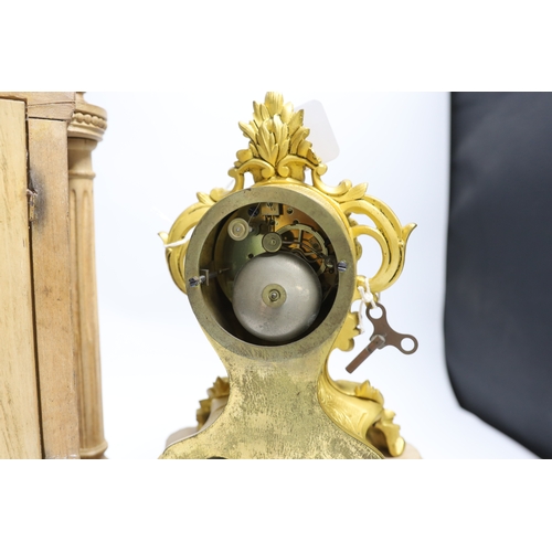 440 - A late 19th century French carved blonde wood mantel clock and similar gilt metal mantel clock. Tall... 