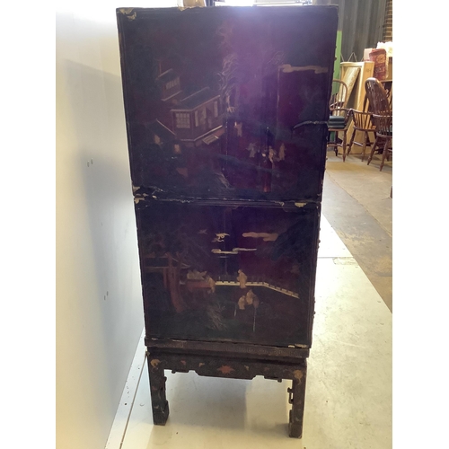 1020 - A Chinese lacquered two section cabinet on stand, width 84cm, depth 51cm, height 128cm