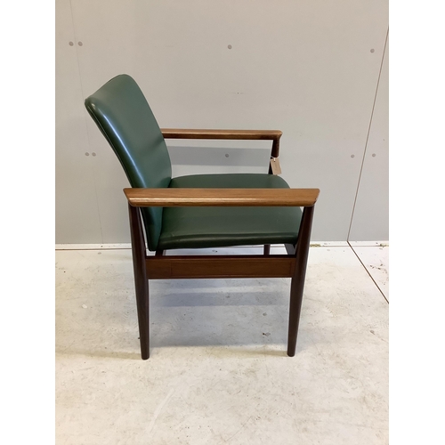 1030 - A mid century Danish Finnjuhl rosewood elbow chair, width 68cm, depth 50cm, height 80cm