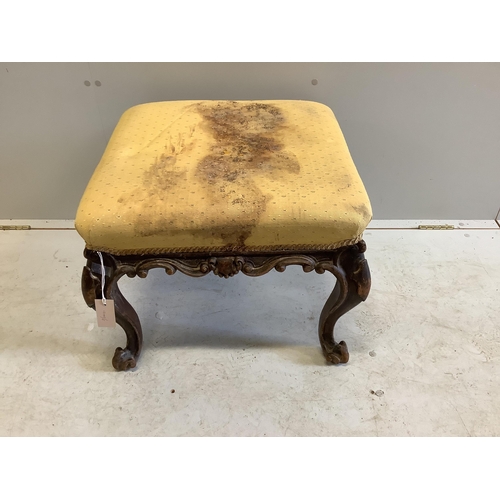 1031 - A Victorian carved mahogany dressing stool, width 56cm, depth 54cm, height 44cm