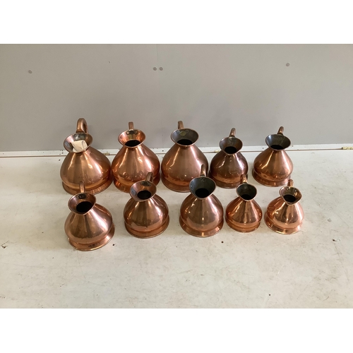 1034 - Ten 19th / early 20th century copper haystack measures, one gallon to a quart, largest height 27cm... 