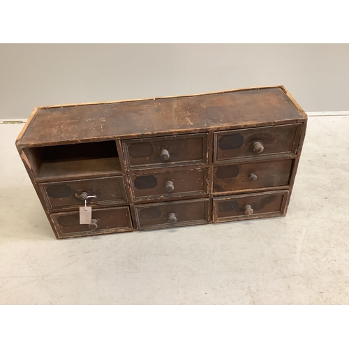 1040 - A painted pine nest of eight drawers, width 78cm, depth 22cm, height 38cm