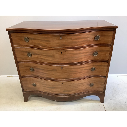 1041 - A George III mahogany serpentine four drawer chest, width 111cm, depth 59cm, height 101cm