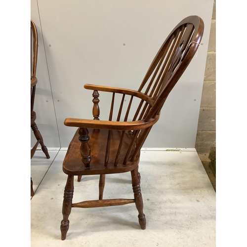 1049 - A set of six 19th century ash and elm Windsor armchairs with H stretchers and later leatherette squa... 