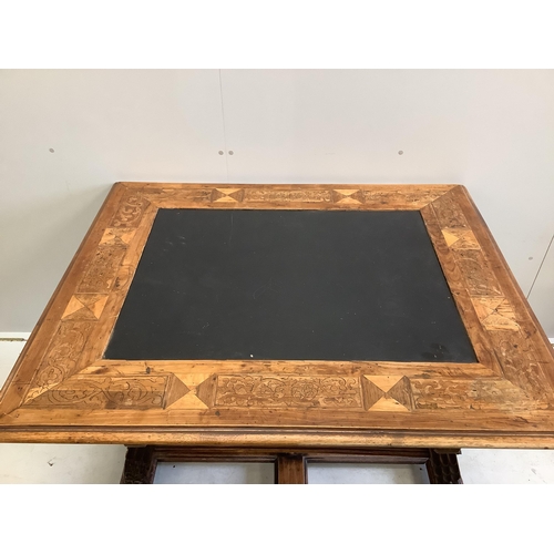 1054 - An Italian marquetry inlaid rectangular walnut slate top centre table, width 123cm, depth 104cm, hei... 