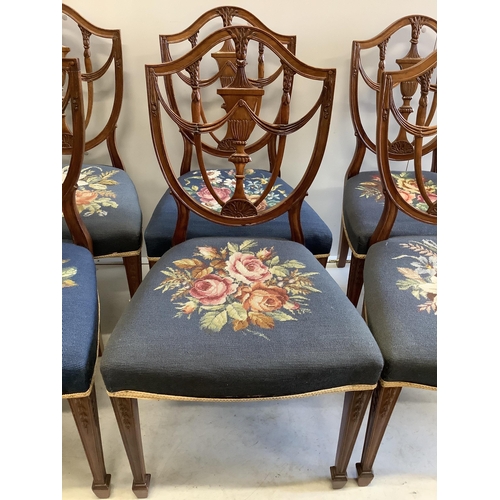 1068 - A set of eight Edwardian Hepplewhite style mahogany dining chairs with tapestry seats, two with arms... 