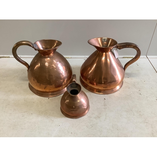 1074 - Two Victorian copper four gallon haystack measures, one engraved Empire Palace and a half gallon m... 