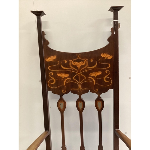 1081 - An Art Nouveau inlaid mahogany elbow chair in the manner of Shapland and Petter, width 65cm, depth 4... 