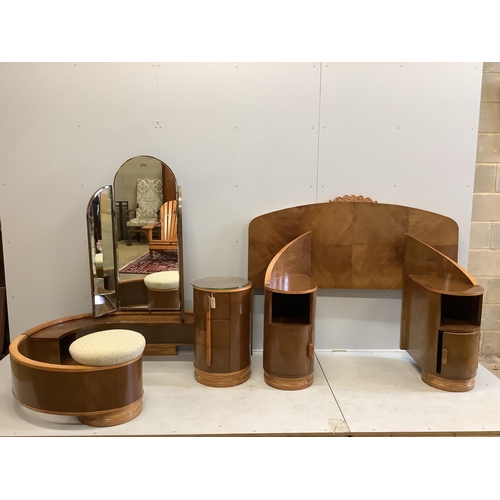 1082 - An Art Deco curved walnut dressing table, width 160cm, depth 106cm, height 156cm together with a mat... 