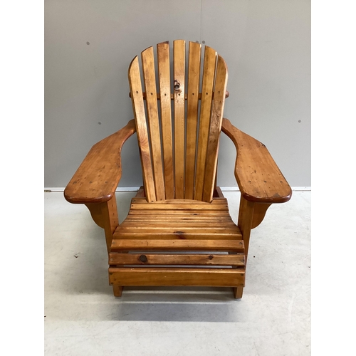 1083 - A stained pine Adirondack garden chair, width 78cm, depth 98cm, height 90cm