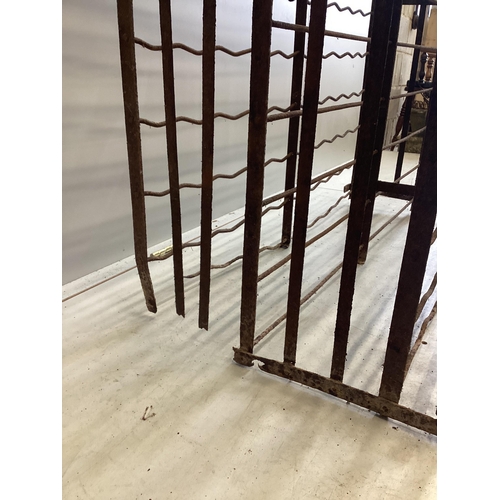 1086 - A French wrought iron wine cage, width 102cm, depth 55cm, height 162cm