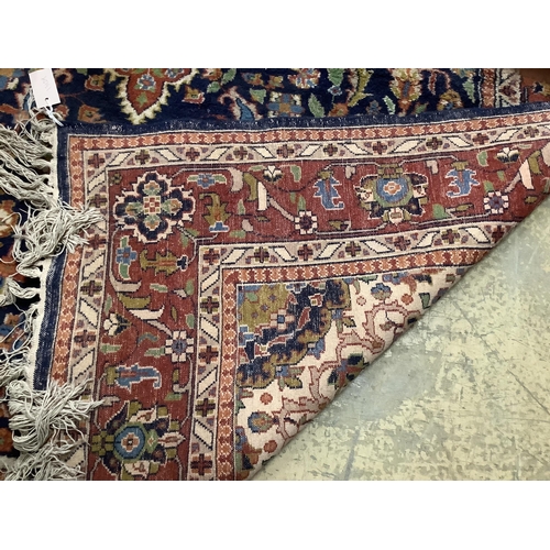 1087 - A Tabriz style ground rug, 216 x 156cm