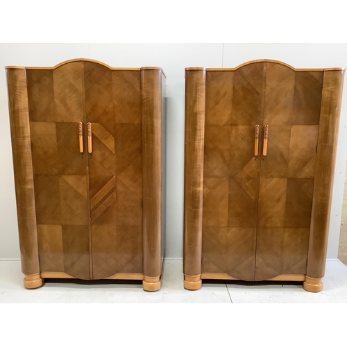 1115 - A pair of Art Deco walnut compactum wardrobes, width 116cm, depth 54cm, height 183cm