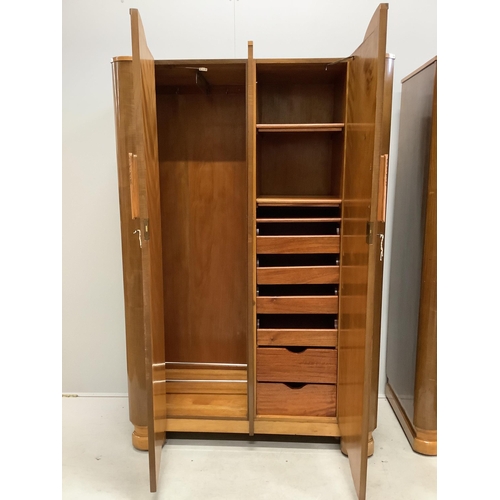 1115 - A pair of Art Deco walnut compactum wardrobes, width 116cm, depth 54cm, height 183cm