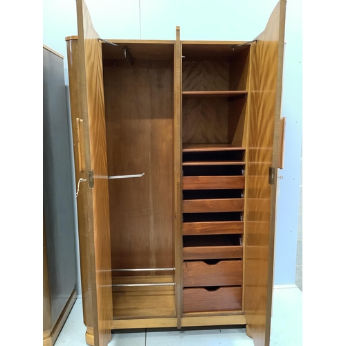 1115 - A pair of Art Deco walnut compactum wardrobes, width 116cm, depth 54cm, height 183cm