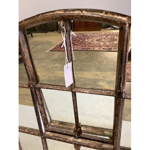 1117 - An industrial style cast iron arched window wall mirror, width 92cm, height 115cm