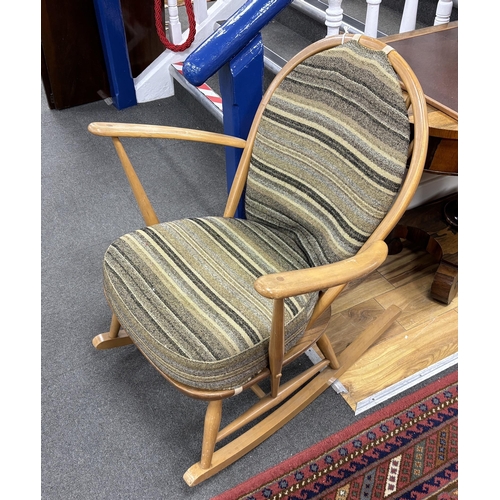 1163 - An Ercol elm and beech rocking chair, width 70cm, depth 78cm, height 85cm