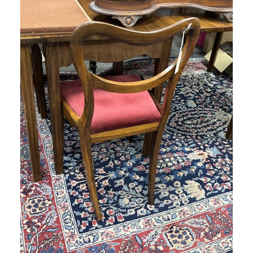 1170 - A set of six early Victorian rosewood dining chairs, two with arms