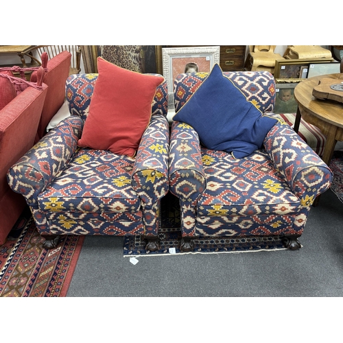 1173 - A pair of early 20th century club armchairs, Kilim style upholstered, width 90cm, depth 98cm, height... 