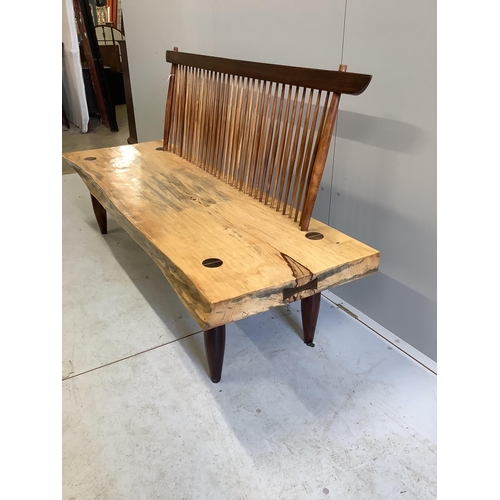 1181 - In the manner of Mira Nakashima a Conoid comb back bench width 180cm, depth 60cm, height 95cm