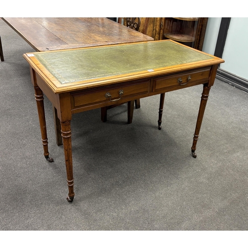 1184 - A Victorian satin walnut two drawer writing table, width 106cm, depth 53cm, height 75cm