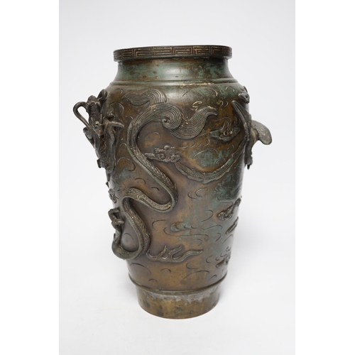 1253 - A Japanese bronze dragon vase, early 20th century, 29cm