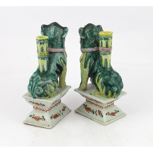 1265 - A pair of Chinese enamelled porcelain Buddhist lion joss stick holders, early 19th century, the li... 