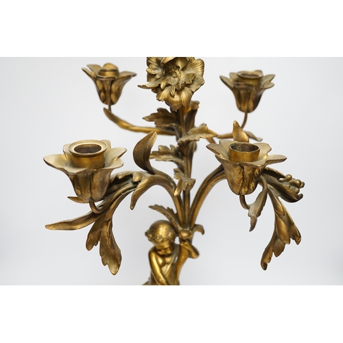 1272 - A 19th century ormolu and slate cherubic candelabrum, 58cm