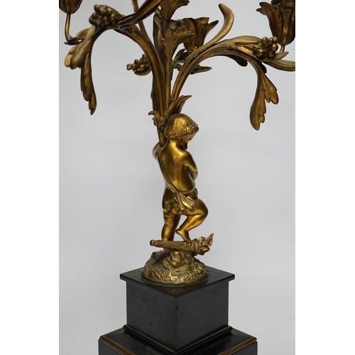 1272 - A 19th century ormolu and slate cherubic candelabrum, 58cm