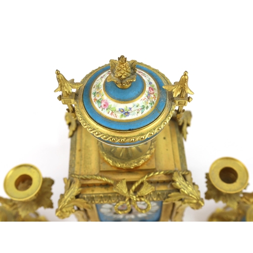 1273 - A 19th century French ormolu and Sevres style porcelain clock garniture, the mantel clock with flora... 