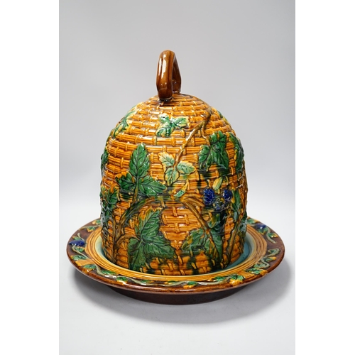 1277 - A Minton style Majolica cheese dish and cover decorated in relief, restored handle, 35cm