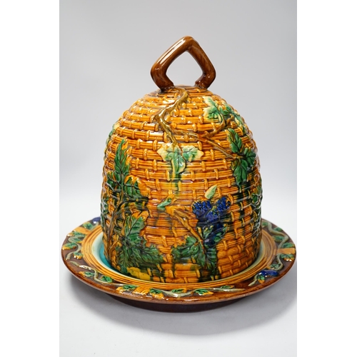 1277 - A Minton style Majolica cheese dish and cover decorated in relief, restored handle, 35cm