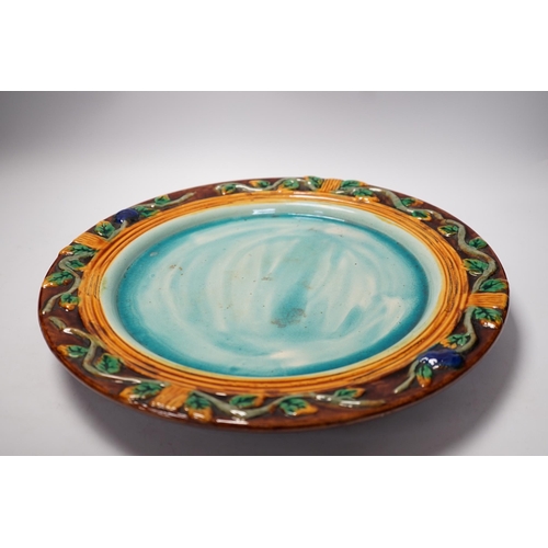 1277 - A Minton style Majolica cheese dish and cover decorated in relief, restored handle, 35cm