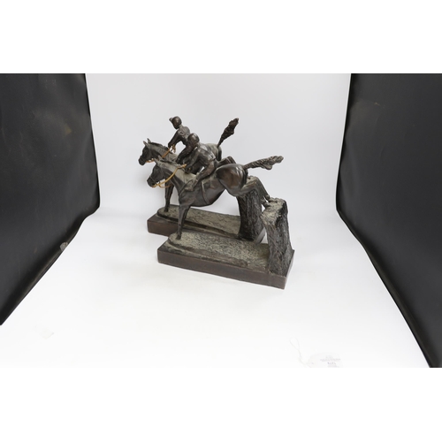 1279 - A pair of bronzed resin models of steeplechasers, 31cm