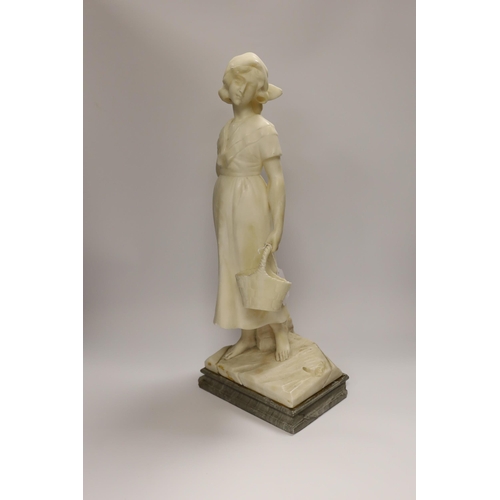 1283 - An alabaster carved figure of a girl holding a basket, 51cm high