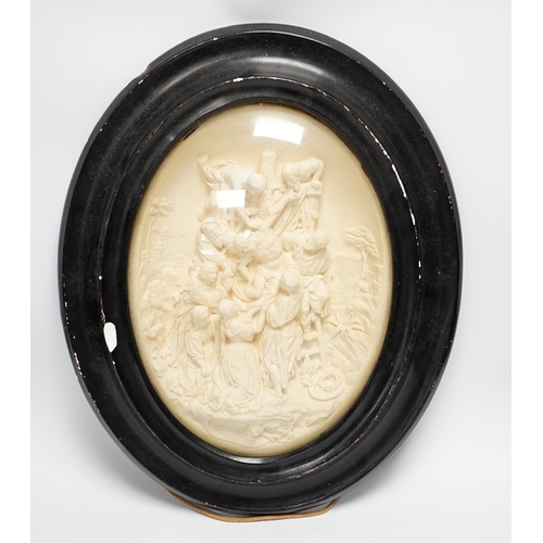 1288 - A pair of framed plaster ovals of the Madonna and Child with John the Baptist and the 'Descent from ... 