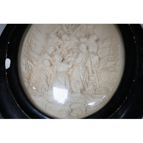 1288 - A pair of framed plaster ovals of the Madonna and Child with John the Baptist and the 'Descent from ... 