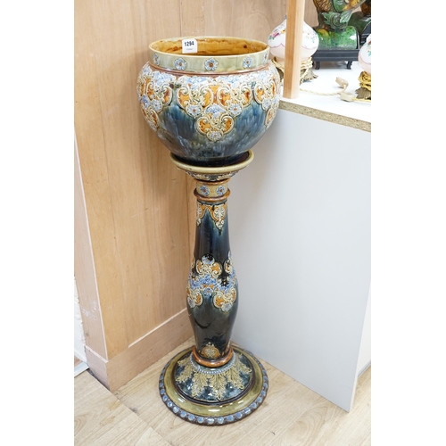 1294 - A Royal Doulton stoneware jardiniere and pedestal (cracked), 104cm