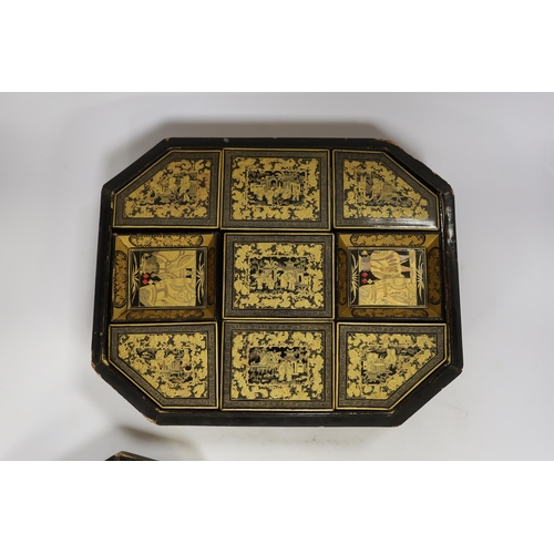 1319 - A mid 19th century Chinese gilt-decorated black lacquer games box containing mother-of-pearl counter... 