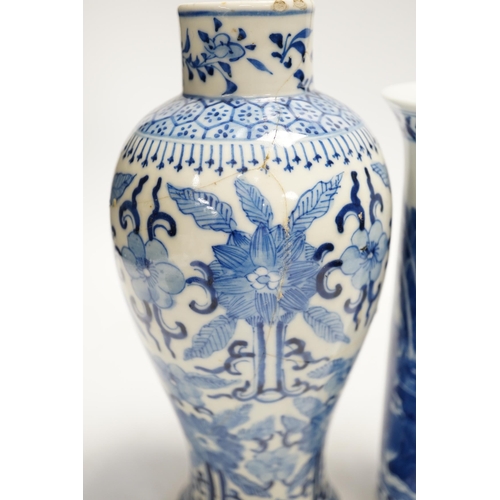 1323 - Two early 20th century Chinese blue and white vases, one restored, 23cm