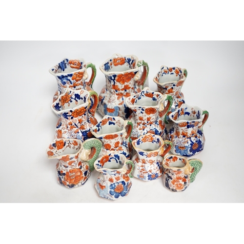 1326 - Eleven graduated Masons ironstone jugs, largest 13cm high