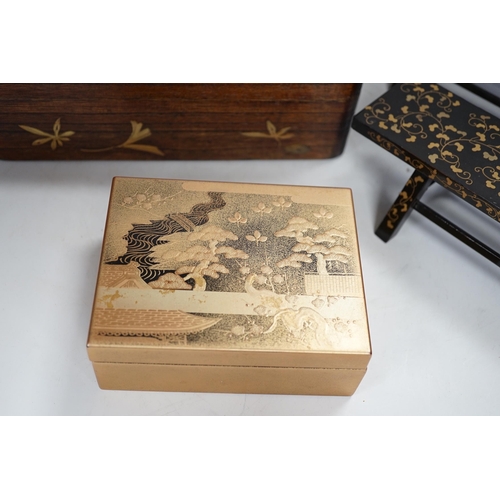 1345 - A group of Japanese lacquer wares, comprising pair of miniature benches and two boxes, Meiji period ... 