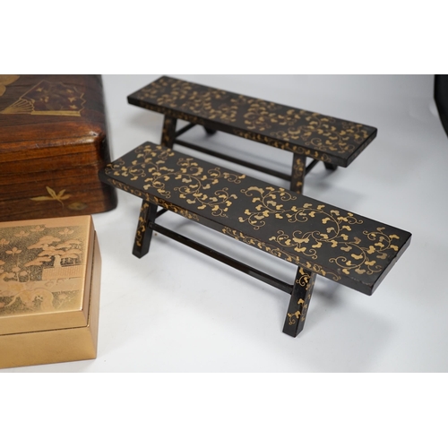 1345 - A group of Japanese lacquer wares, comprising pair of miniature benches and two boxes, Meiji period ... 