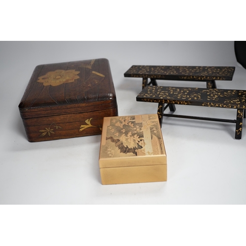 1345 - A group of Japanese lacquer wares, comprising pair of miniature benches and two boxes, Meiji period ... 