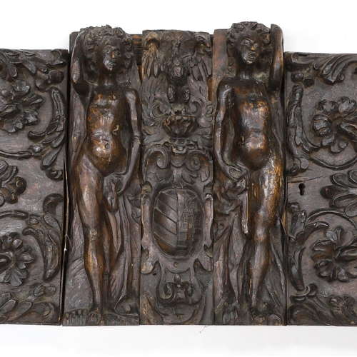 1357 - A 17th century French carved walnut triptych panel, formed from several associated sections, with ce... 