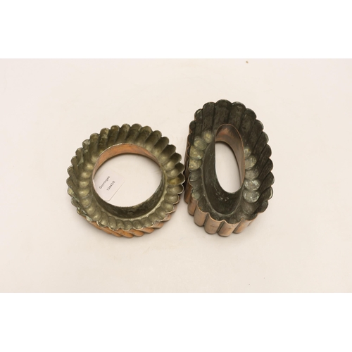 1420 - Two Victorian copper jelly moulds, the ring shaped example stamped Baileys hotel and the overall exa... 