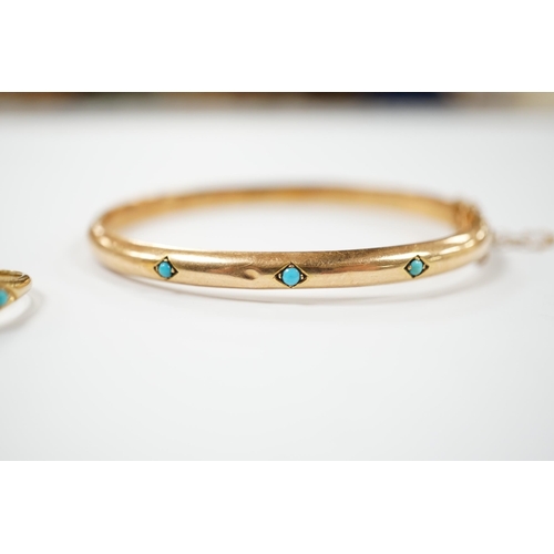 1955 - A Victorian yellow metal and three stone cabochon turquoise set hinged bangle, together with a simil... 